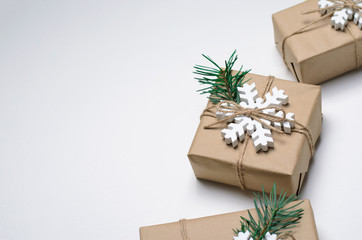 Christmas Gifts with Fir Branches on White Background, Winter Holidays Concept