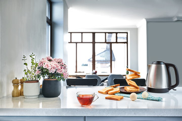 Flying toasts for breakfast and cup of tea drink. Levitation food and healthy breakfast concept.