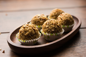 Oats laddu or Ladoo also known as Protein Energy balls. served in a plate or bowl. selective focus