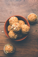 Oats laddu or Ladoo also known as Protein Energy balls. served in a plate or bowl. selective focus