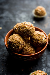 Oats laddu or Ladoo also known as Protein Energy balls. served in a plate or bowl. selective focus