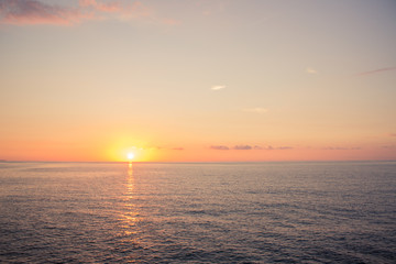 sea sunset romantic nature scenic landscape with horizon line and clear weather sky