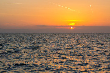 sea sunset romantic nature scenic landscape with horizon line and clear weather sky