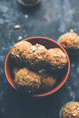 Oats laddu or Ladoo also known as Protein Energy balls. served in a plate or bowl. selective focus