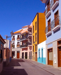 Beautiful colorful buildings in a narrow street in the old town of Puerto de la Cruz, one of the most popular tourist cities in Tenerife