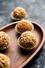 Oats laddu or Ladoo also known as Protein Energy balls. served in a plate or bowl. selective focus