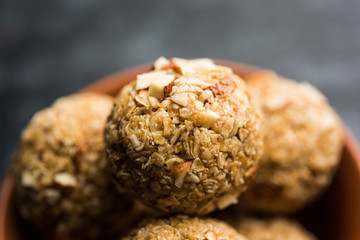 Oats laddu or Ladoo also known as Protein Energy balls. served in a plate or bowl. selective focus