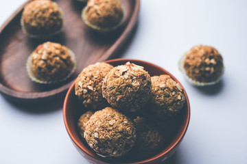 Oats laddu or Ladoo also known as Protein Energy balls. served in a plate or bowl. selective focus