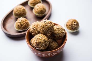 Oats laddu or Ladoo also known as Protein Energy balls. served in a plate or bowl. selective focus
