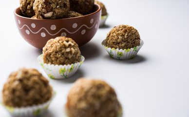 Oats laddu or Ladoo also known as Protein Energy balls. served in a plate or bowl. selective focus