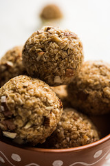 Oats laddu or Ladoo also known as Protein Energy balls. served in a plate or bowl. selective focus
