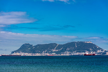 The rock of Gibraltar and a cargo ship