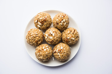 Oats laddu or Ladoo also known as Protein Energy balls. served in a plate or bowl. selective focus