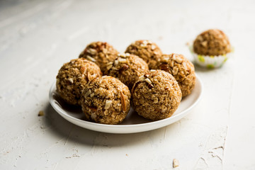 Oats laddu or Ladoo also known as Protein Energy balls. served in a plate or bowl. selective focus
