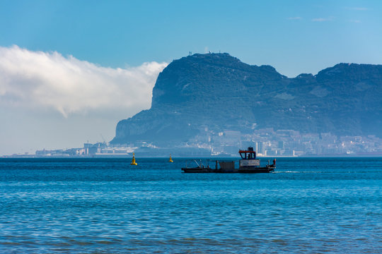 Fototapeta The rock of Gibraltar and a boat