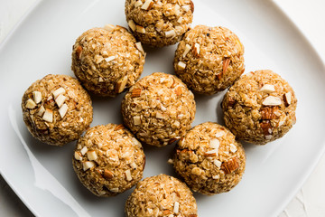 Oats laddu or Ladoo also known as Protein Energy balls. served in a plate or bowl. selective focus