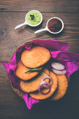 Shegaon or Rajasthani Kachori served with green Chutney and tomato ketchup