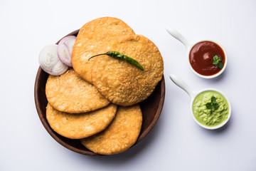 Shegaon or Rajasthani Kachori served with green Chutney and tomato ketchup