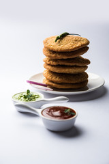 Shegaon or Rajasthani Kachori served with green Chutney and tomato ketchup