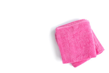 Pink towel isolated on white background.