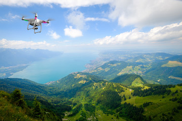 Drone flying above Aerial landscape of Geneva lake at summer time - Powered by Adobe