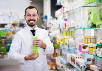 Fototapeta na wymiar Male pharmacist in pharmacy