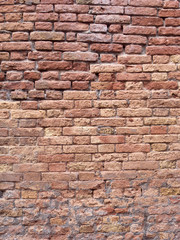 Red brick wall in the road