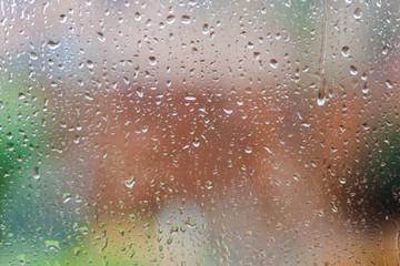 Abstract background texture of rain drops on a window