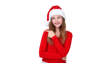Young girl in santa hat on white background