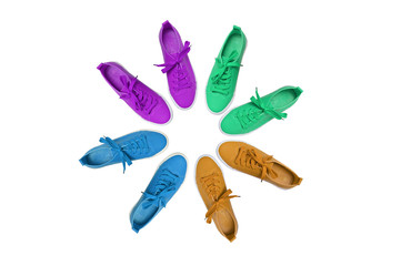 Sport shoes. Many pairs of sneakers stand in the shape of a circle. White isolate