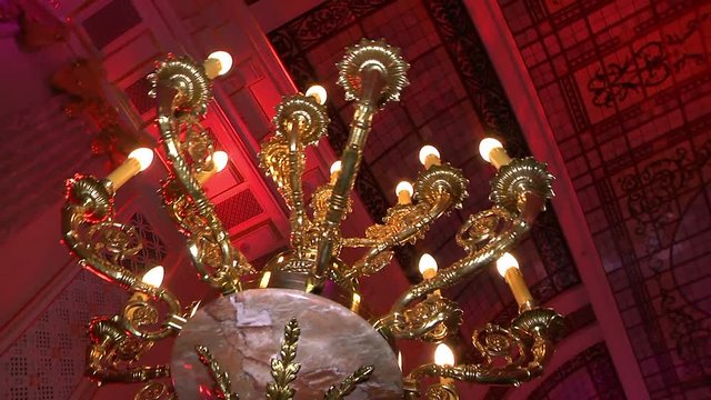 Chandelier and Christmas tree in the palace, defocused futage of  Christmas tree in the banquet hall, 