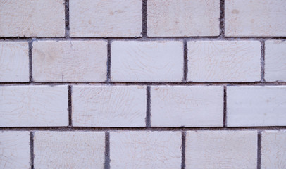 white decorative marble tiled brick wall. background, texture.