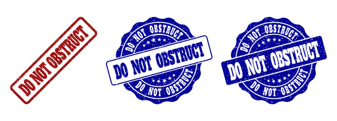 DO NOT OBSTRUCT grunge stamp seals in red and blue colors. Vector DO NOT OBSTRUCT labels with scratced texture. Graphic elements are rounded rectangles, rosettes, circles and text labels.