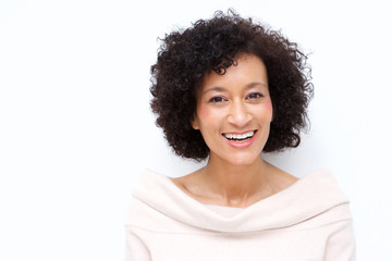 Close up attractive middle age african american woman smiling against white background - Powered by Adobe