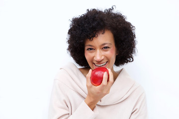 Close up healthy african american woman eating apple