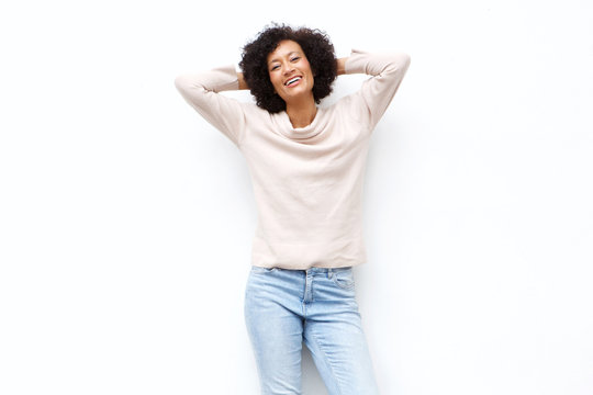 Carefree Older Woman Smiling With Hands Behind Head