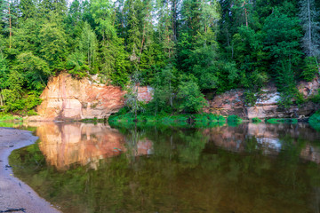 beautiful sandstone cliffs on the shores of river Amata in Latvia
