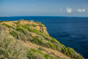 Aegean sea south landscape panoramic view from high rock cape top point of mountain, bright blue water surface and board horizon line with sky