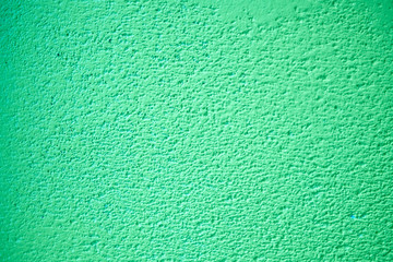 The texture of plastered green wall, background