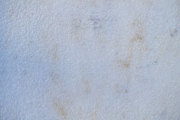 The texture of thin layer of ice or snow, background