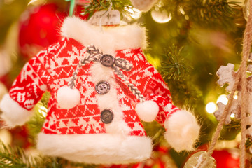 Tiny Christmas Sweater Hanging in a Tree