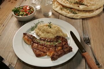 grilled  steak with vegetables and pita