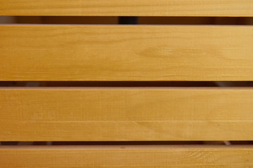 The texture of a wooden wall with horizontal stripes of natural boards, background