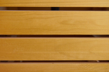 The texture of a wooden wall with horizontal stripes of natural boards, background