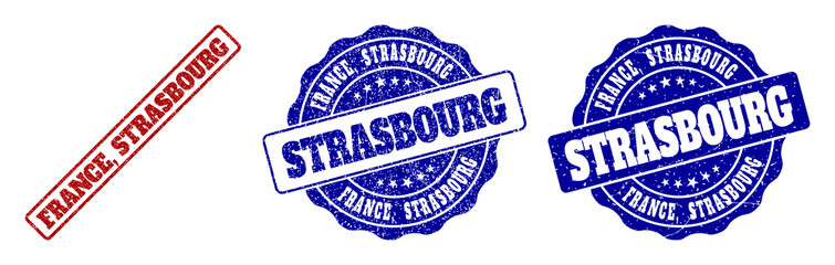 FRANCE, STRASBOURG grunge stamp seals in red and blue colors. Vector FRANCE, STRASBOURG signs with grunge effect. Graphic elements are rounded rectangles, rosettes, circles and text labels.
