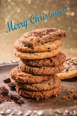 Healthy homemade, oatmeal cookies on a golden background. Baking for Christmas and New Year