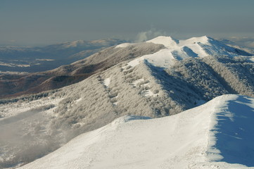 A stunning view of the snow-capped mountains. Bieszczady National Park. Polonina Wetlinska.