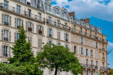 Fototapeta na wymiar Paris, beautiful building in the center, typical parisian facade boulevard Voltaire 
