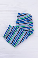 Folded striped pants.