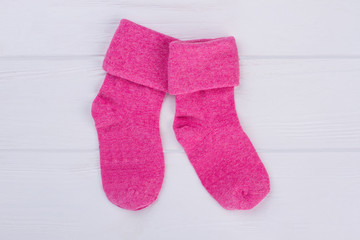 Pair of warm pink winter socks.